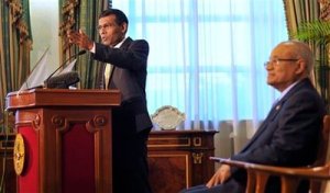 Mohamed Nasheed and President Maumoon (seated) when the result was announced - AP picture by Sinan Hussain