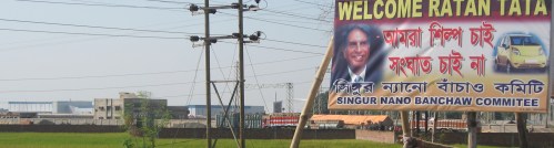 Pro-Tata poster with Nano factory in background - pic taken Nov '08