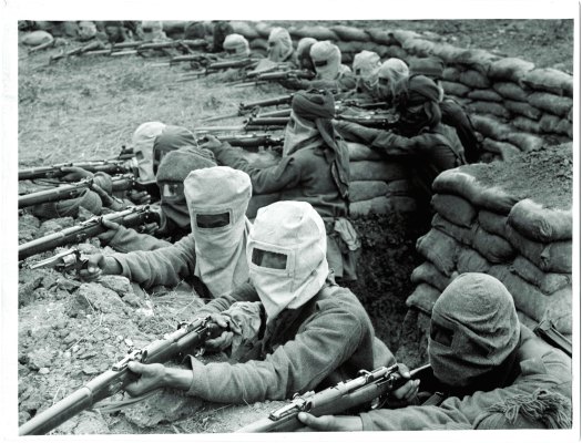 Indian infantry in France with an early version of gas masks (photo from Vedika Kant book)