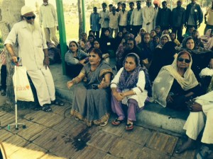 Women with heath problems at a protest meeting