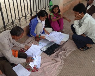 BJP workers checking election lists during Patna's polling day