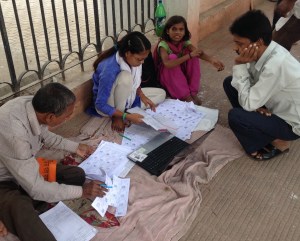 BJP workers checking election lists during Patna's polling day