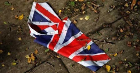 a-british-flag-which-was-washed-away-by-heavy-rains-the-day-before-lies-on-the-street-in-london-june_448171_